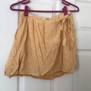 American Eagle mini wrap skirt with lace trim.